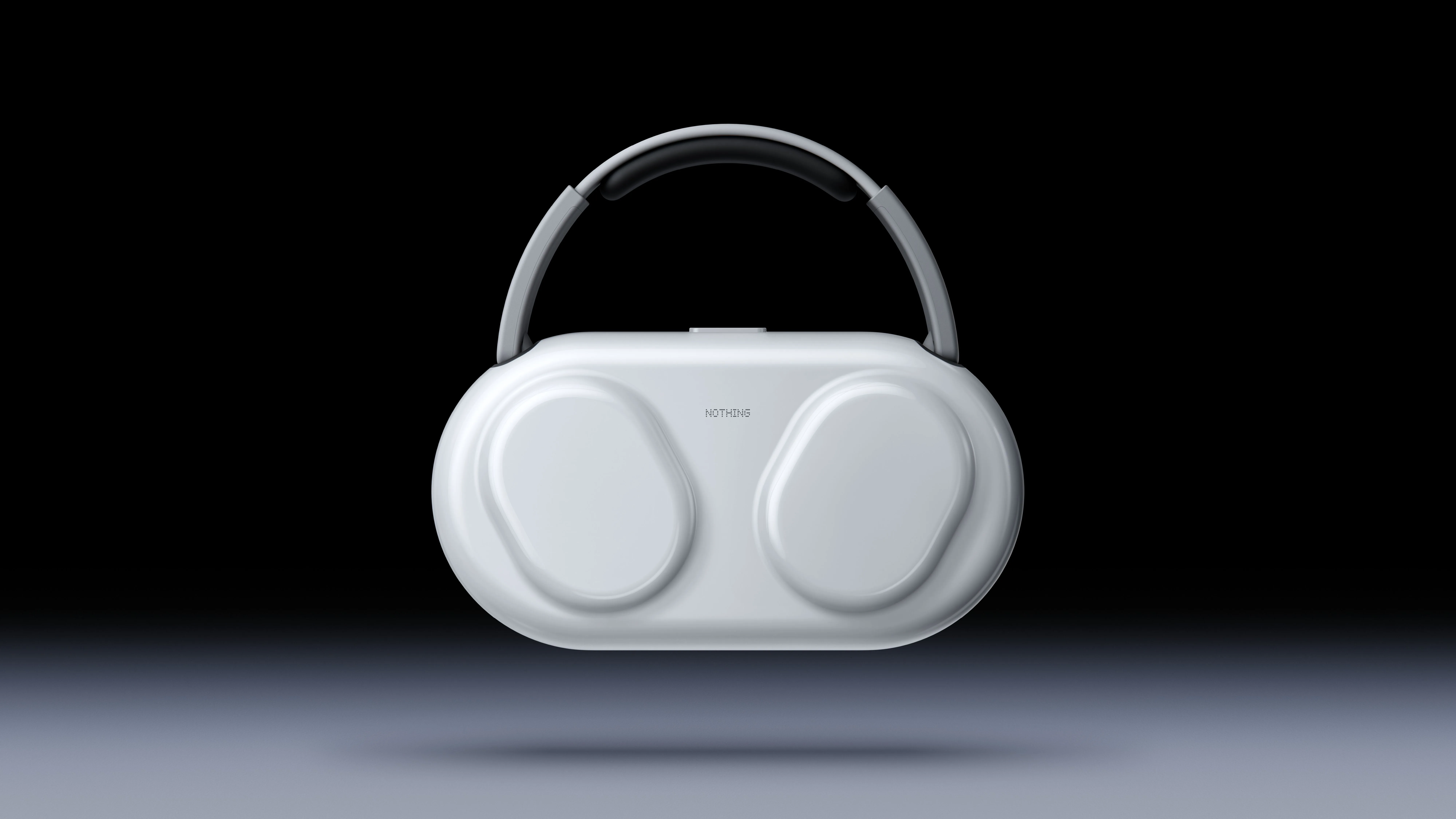 NOTHING LAISSE ENTREVOIR LA TECHNOLOGIE DE SON HEADPHONE (1) PRO DERRIÈRE DEUX PANNEAUX DE VERRE